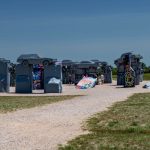 Carhenge in Alliance, Nebraska: vintage cars arranged upright and stacked in a circle to replicate Stonehenge